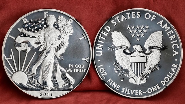 Side-by-side comparison of 2013 American Silver Eagle regular bullion finish versus 2013-W Enhanced Uncirculated finish highlighting surface treatment differences